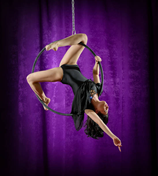 istock Woman doing gymnastic exercises on the hoop 1013698266