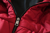 Close up of red down jacket, winter fashion outfit