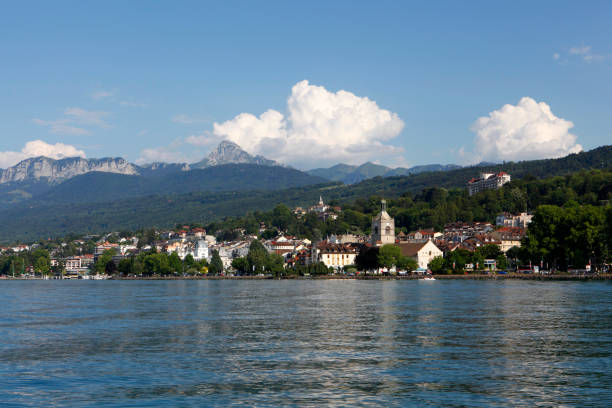 Evian seen from Lake Geneva Evian, view from Lake Geneva, Haute-Savoie, France evian les bains stock pictures, royalty-free photos & images