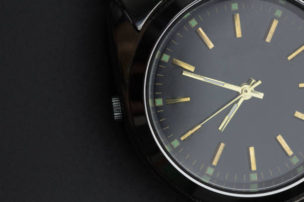istock close up luxury watch on black background 1013708138