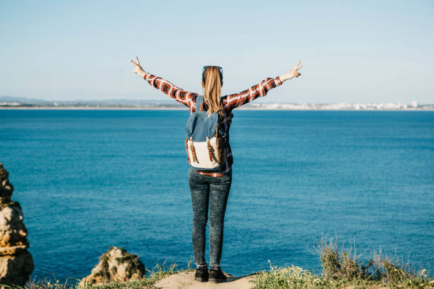 istock Tourist or traveler with a backpack on the Atlantic coast 1013715648