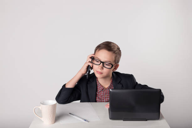 istock Young businessman calling by mobile phone 1013721768