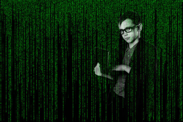 business child with in a suit laptop in matrix style. hacker on techno-digital background.