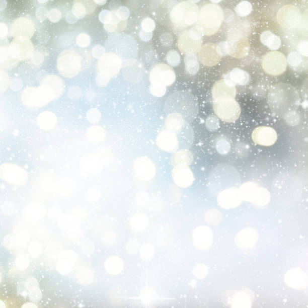 istock Christmas light background.  Holiday glowing backdrop. Defocused Background With Blinking Stars. Blurred Bokeh. 1013728196
