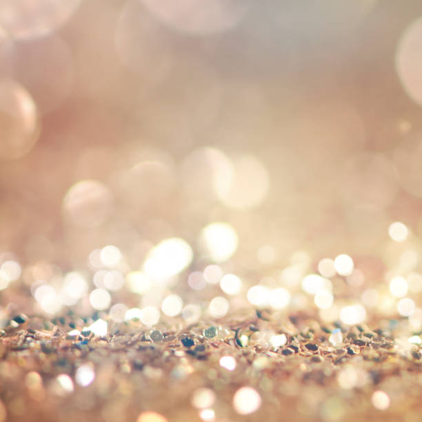 istock Christmas light background.  Holiday glowing backdrop. Defocused Background With Blinking Stars. Blurred Bokeh. 1013728948