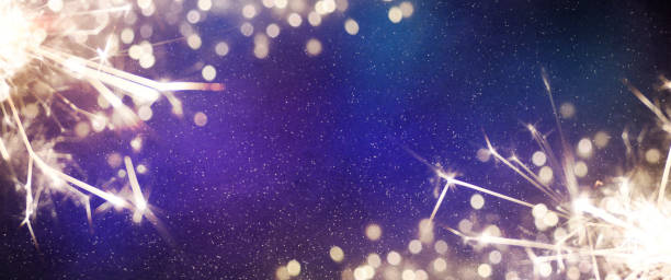 istock Christmas light background.  Holiday glowing backdrop. Defocused Background With Blinking Stars. Blurred Bokeh. 1013730346