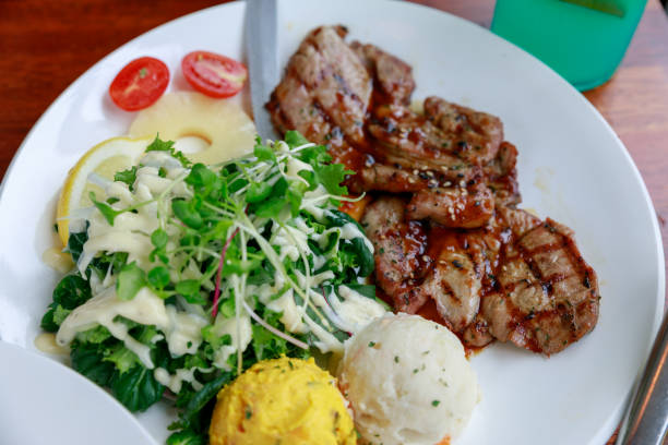 istock Grilled pork steak and vegetables 1013730612