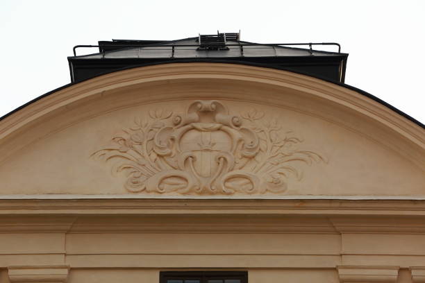 istock Close up view on beautiful details on old building facade. Architecture concept. 1013730752