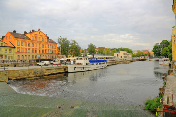istock Beautiful view on Uppsala from river side on beautiful summer day. Beautiful landscape backgrounds. Tourism / travel concept. Sweden, Europe. 1013730788