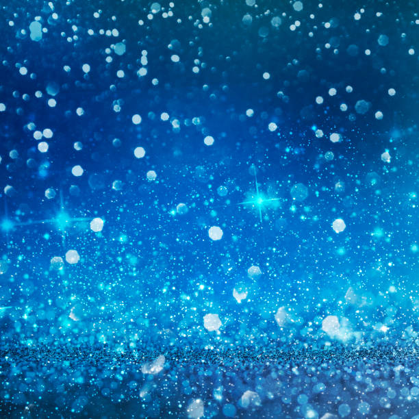 istock Christmas light background.  Holiday glowing backdrop. Defocused Background With Blinking Stars. Blurred Bokeh. 1013731608