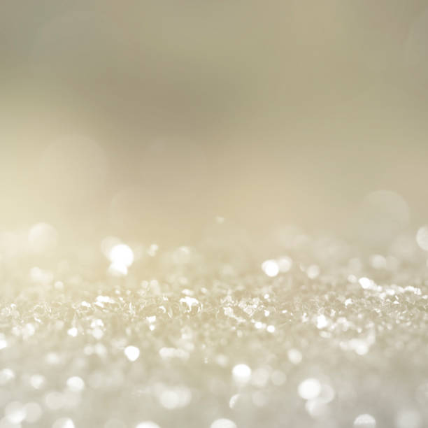istock Christmas light background.  Holiday glowing backdrop. Defocused Background With Blinking Stars. Blurred Bokeh. 1013733910