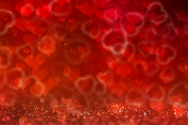 istock Valentines Day light background.  Holiday glowing backdrop. Defocused Background With Blinking Stars. Blurred Bokeh. 1013734170