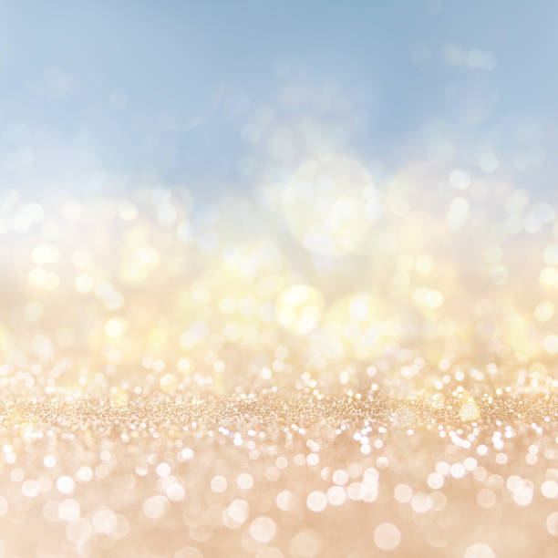 istock Christmas light background.  Holiday glowing backdrop. Defocused Background With Blinking Stars. Blurred Bokeh. 1013734562
