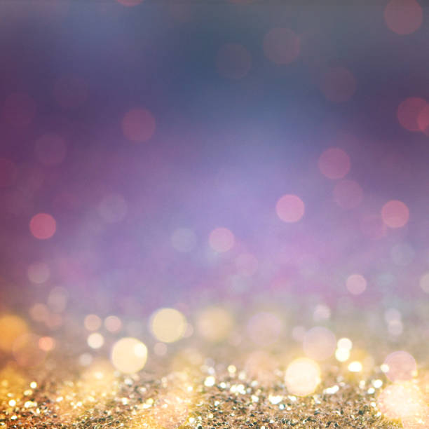 istock Christmas light background.  Holiday glowing backdrop. Defocused Background With Blinking Stars. Blurred Bokeh. 1013734968