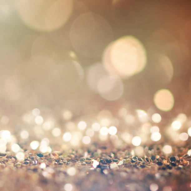 istock Christmas light background.  Holiday glowing backdrop. Defocused Background With Blinking Stars. Blurred Bokeh. 1013739938