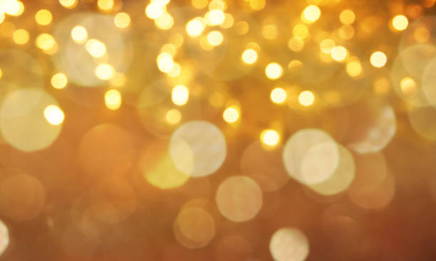 istock Christmas light background.  Holiday glowing backdrop. Defocused Background With Blinking Stars. Blurred Bokeh. 1013744222