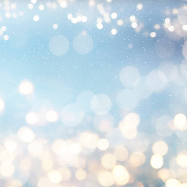 istock Christmas light background.  Holiday glowing backdrop. Defocused Background With Blinking Stars. Blurred Bokeh. 1013749474