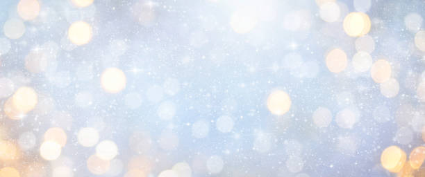 istock Christmas light background.  Holiday glowing backdrop. Defocused Background With Blinking Stars. Blurred Bokeh. 1013757034