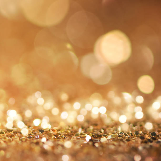 istock Christmas light background.  Holiday glowing backdrop. Defocused Background With Blinking Stars. Blurred Bokeh. 1013757862