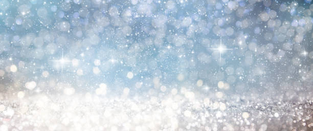 istock Christmas light background.  Holiday glowing backdrop. Defocused Background With Blinking Stars. Blurred Bokeh. 1013758210