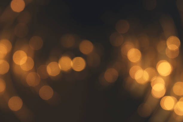 istock Bokeh light background.  Holiday glowing backdrop. Defocused Background With Blinking Stars. Blurred Bokeh. 1013761356