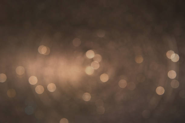 istock Bokeh light background.  Holiday glowing backdrop. Defocused Background With Blinking Stars. Blurred Bokeh. 1013761912