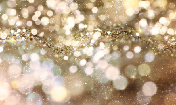 istock Christmas light background.  Holiday glowing backdrop. Defocused Background With Blinking Stars. Blurred Bokeh. 1013762198