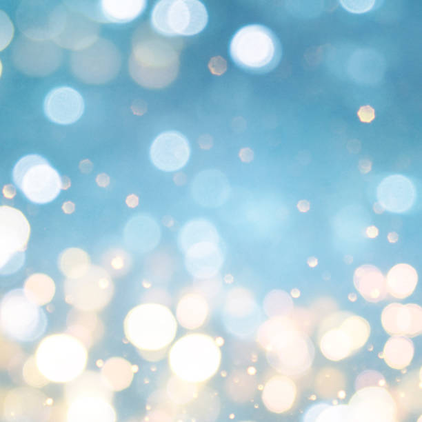 istock Christmas light background.  Holiday glowing backdrop. Defocused Background With Blinking Stars. Blurred Bokeh. 1013764632