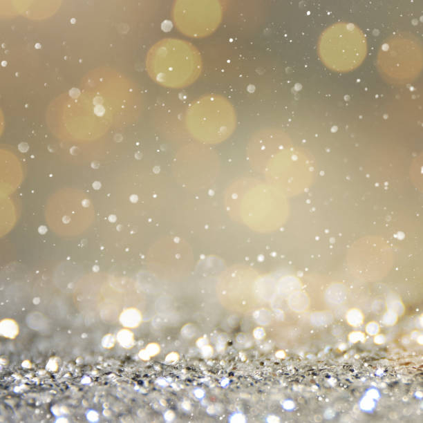 istock Christmas light background.  Holiday glowing backdrop. Defocused Background With Blinking Stars. Blurred Bokeh. 1013764662