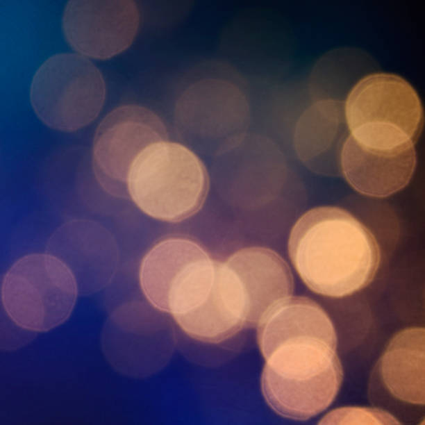 istock Christmas light background.  Holiday glowing backdrop. Defocused Background With Blinking Stars. Blurred Bokeh. 1013764692