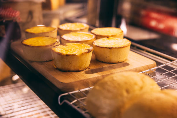 istock Cheese tarts on wooden plate that ready for sell. 1013765154