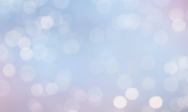 istock Christmas light background.  Holiday glowing backdrop. Defocused Background With Blinking Stars. Blurred Bokeh. 1013765424