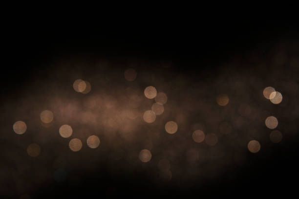 istock Bokeh light background.  Holiday glowing backdrop. Defocused Background With Blinking Stars. Blurred Bokeh. 1013765658