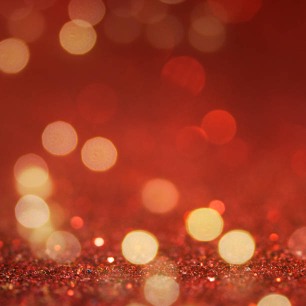 istock Christmas light background.  Holiday glowing backdrop. Defocused Background With Blinking Stars. Blurred Bokeh. 1013766398