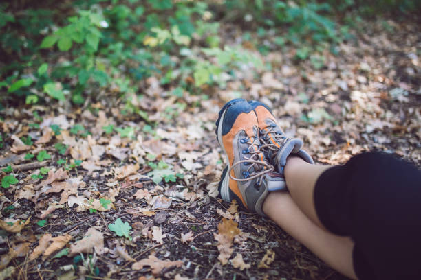 istock Woman resting after walking on forest. 1013777868