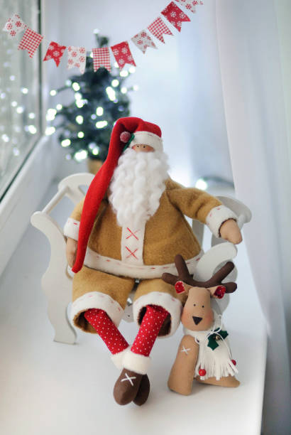 istock Santa Claus with a deer 1013786084