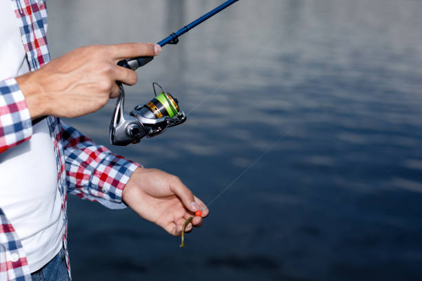 istock Fishing in the river at sunset. 1013795988