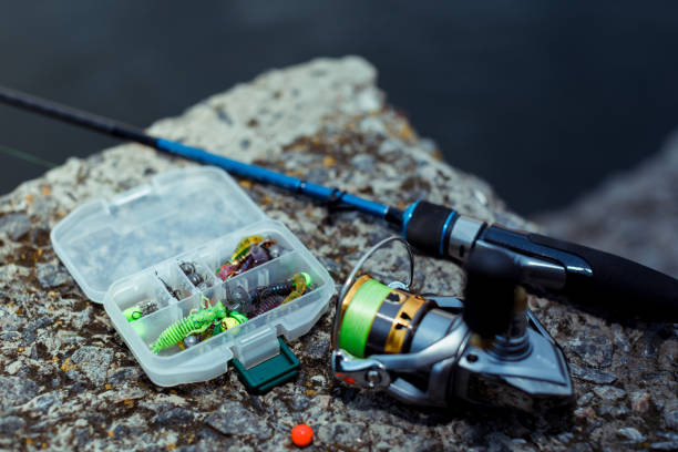istock Fishing tackle. fishing spinning, hooks and lures 1013796184