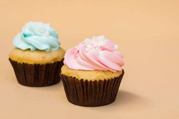 istock sweet cup cake dessert on yellow background and copy space 1013802806