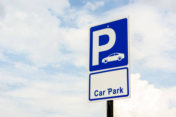 istock Signs for car park outdoors on the sky background 1013802868