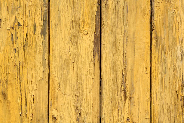 istock Yellow color old grunge wooden fence pattern. 1013806764