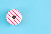 Donut on blue background and copy space
