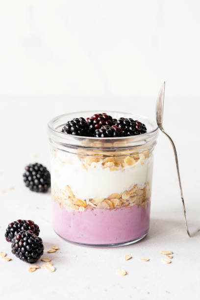 istock Yogurt parfait with oats and blackberries 1013816748