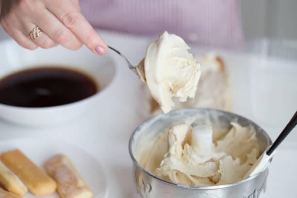 istock process of ice cream-tiramisu preparation. Tiramisu making 1013817134
