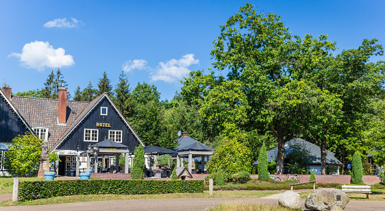Holten, Netherlands - June 28, 2018: Panorama of hotel and restaurant in national park Sallandse Heuvelrug, The Netherlands