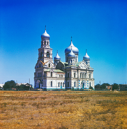 Church of the Nativity of the Blessed Virgin in the village of Nikolskoye in the Astrakhan region, Russia.\nAstrakhan is located in the South of Russia, on the border of Europe and Asia.\n\nPhoto of 1991.\nThe film ( slide 6x6 cm) was scanned  by a famous brand scanner.