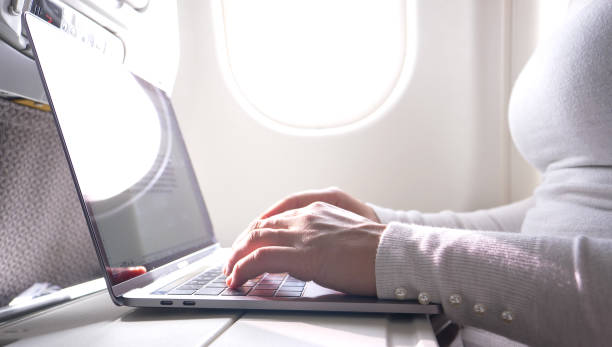 istock CLOSE UP: Unknown young Caucasian businesswoman types on her high tech laptop. 1013829502