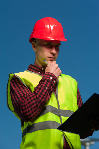 istock Concept of engineers and windmills 1013834806
