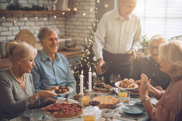 istock Seniors Christmas dinner party 1013839608
