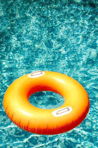istock ring floating in a refreshing blue swimming pool 1013863998
